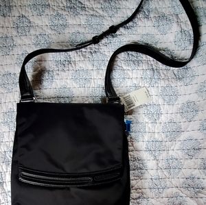 Tumi slim flap cross body